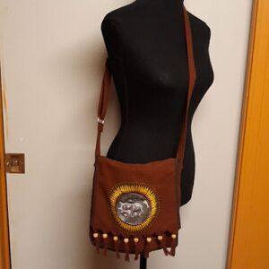 Hobo style elephant crossbody bag